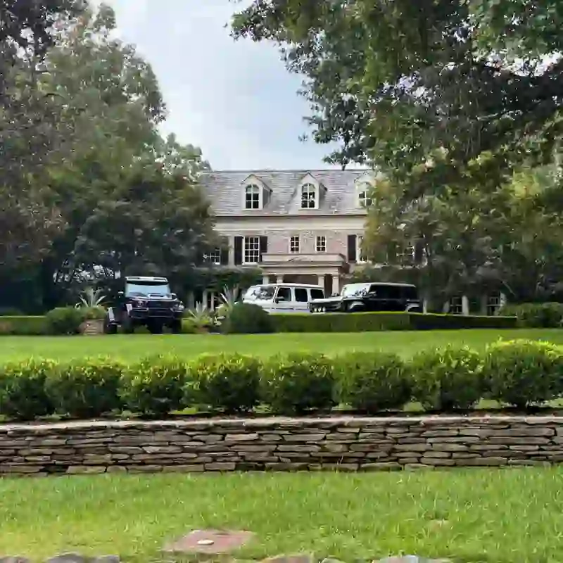 Large estate home on a tree-lined residential street in Buckhead, Atlanta