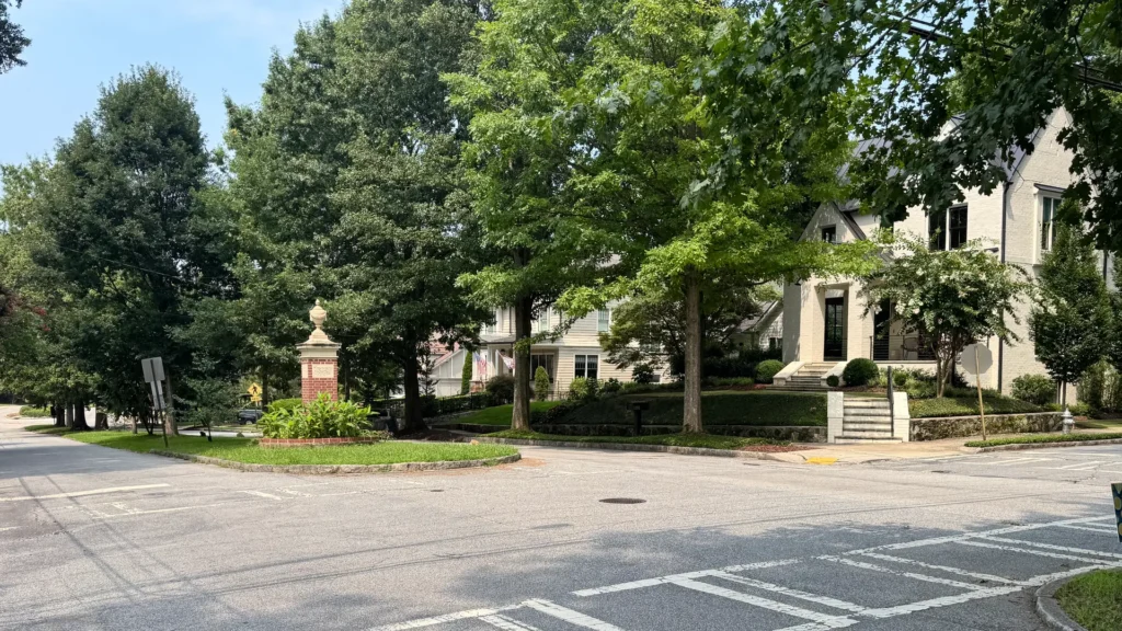 Tree-lined residential street with historic homes in Atlanta’s Morningside-Lenox Park neighborhood.
